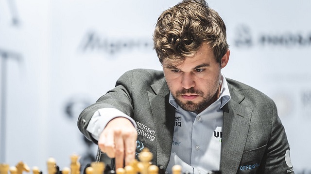 Magnus Carlsen retuvo el título mundial de ajedrez, tras superar por 7.5-3.5 al ruso Ian Nepomniachtchi, en el match celebrado en Dubái. Foto: FIDE.